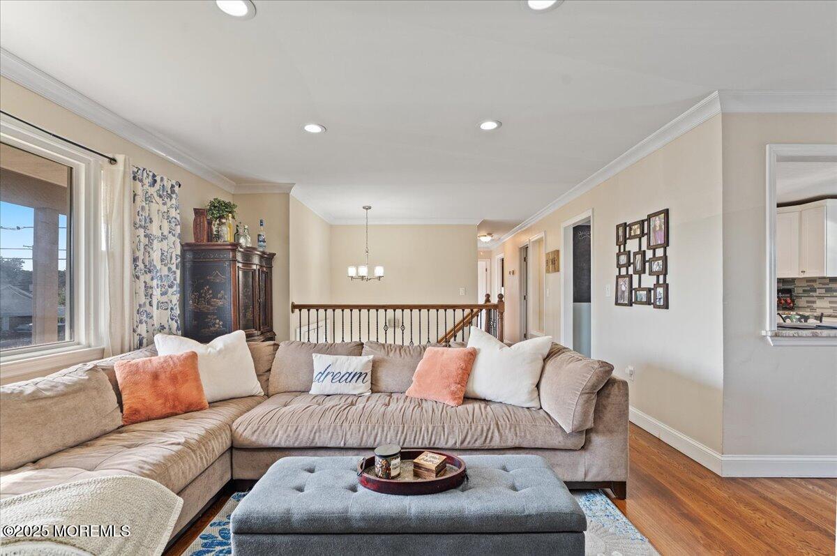 165 Port Road Brick, NJ 08723 - Photo 7 of 48 a living room with furniture and a wooden floor