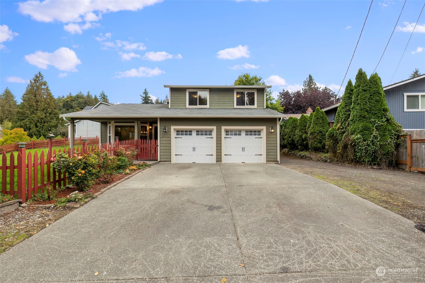 27474 Gamble Bay Road Northeast Kingston, WA 98346 - Photo 1 of 40 front view of a house with a yard