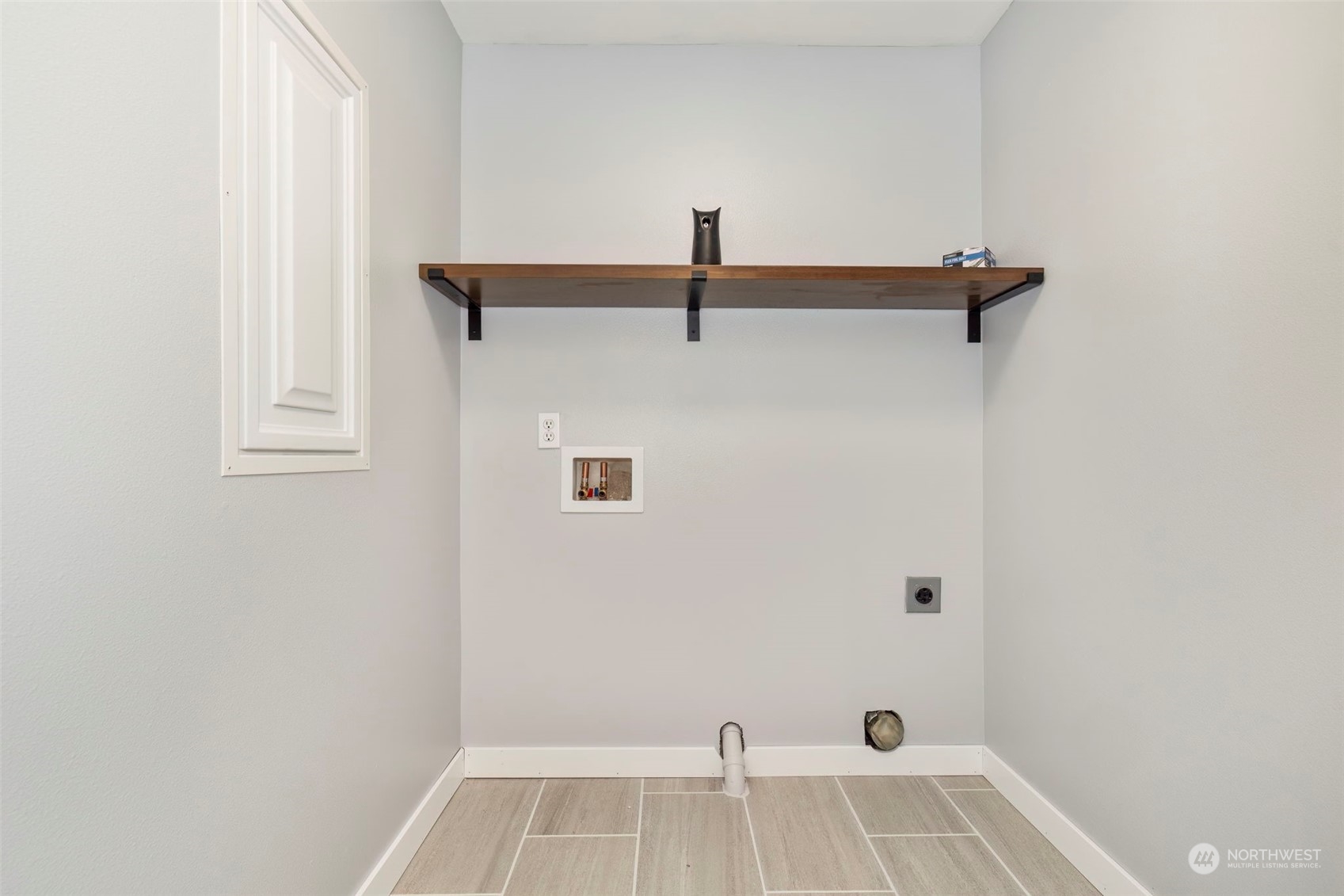 27474 Gamble Bay Road Northeast Kingston, WA 98346 - Photo 28 of 40 a bathroom with a sink and vanity