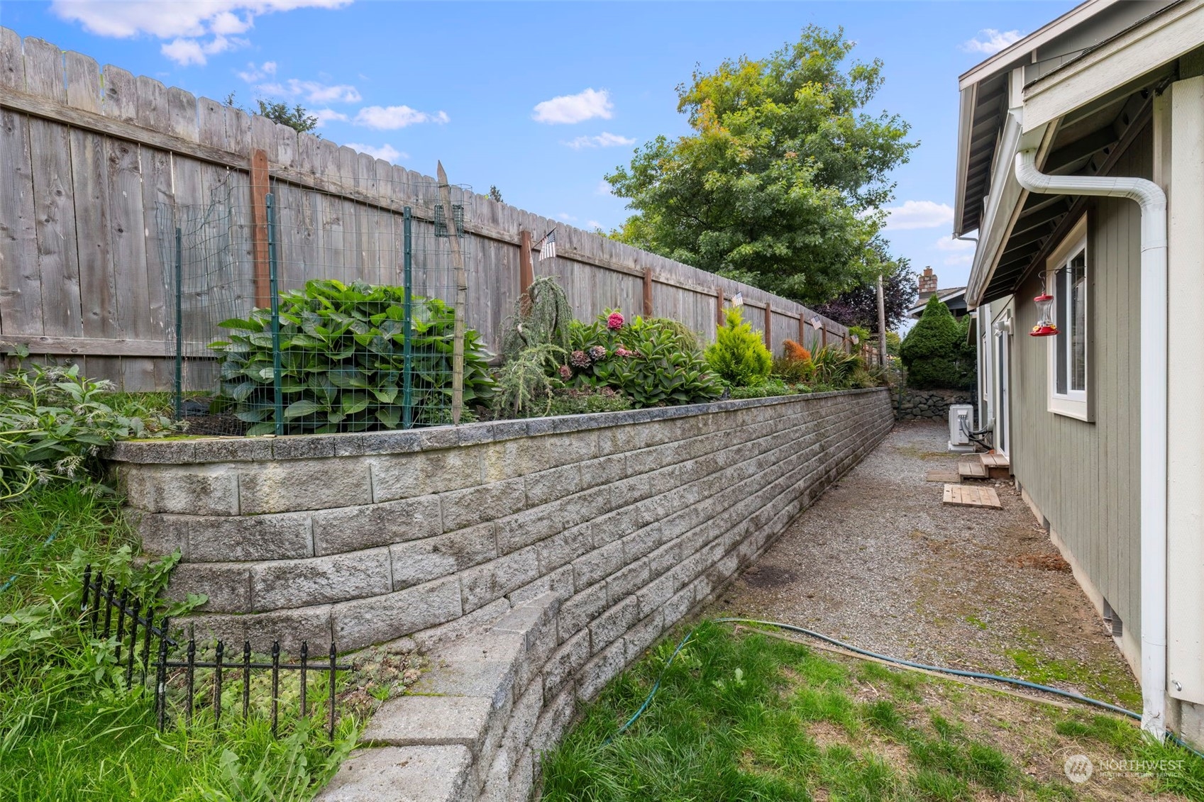 27474 Gamble Bay Road Northeast Kingston, WA 98346 - Photo 33 of 40 a view of a pathway of a house with a yard