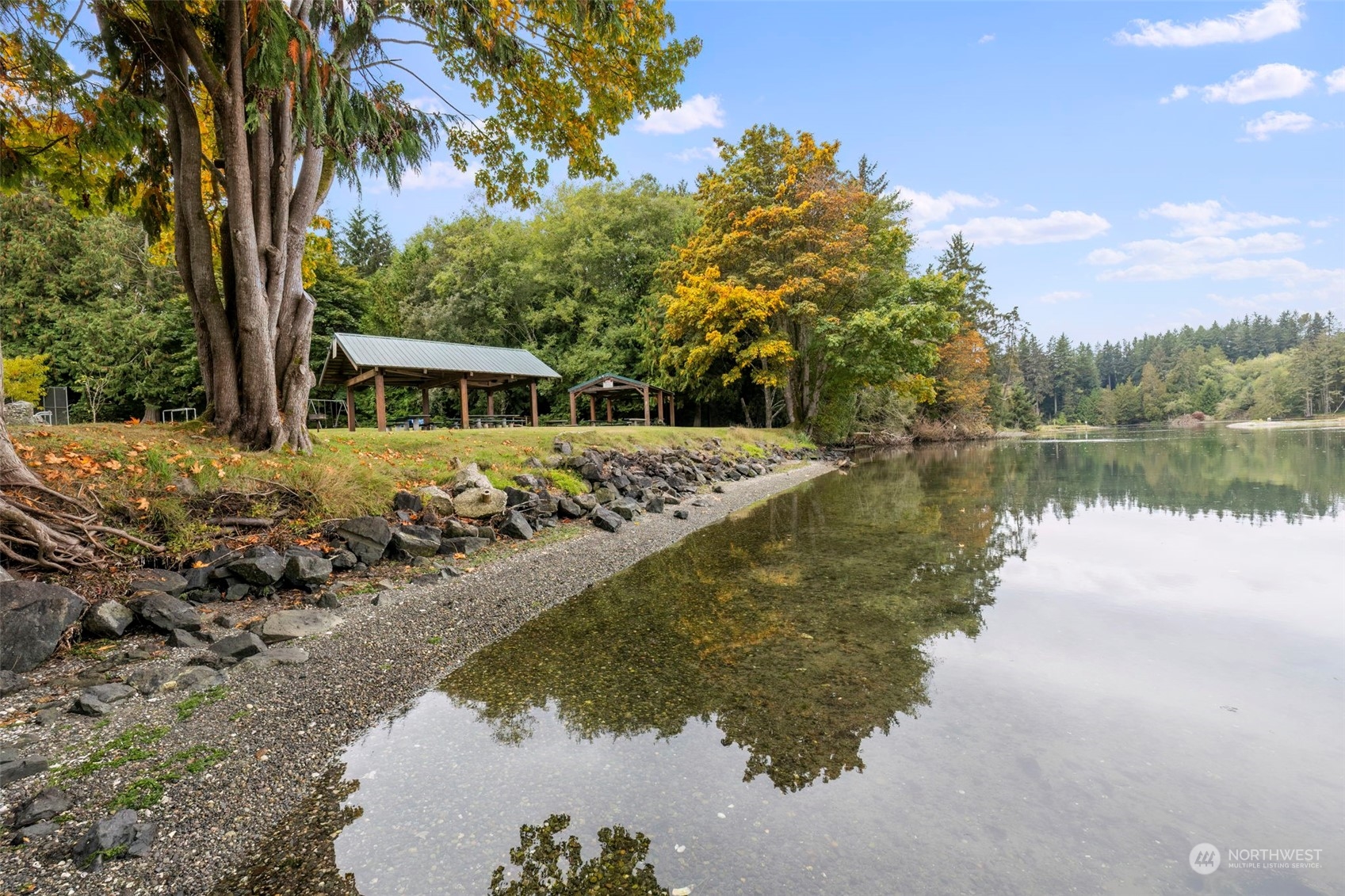 27474 Gamble Bay Road Northeast Kingston, WA 98346 - Photo 35 of 40 a view of a house with a yard