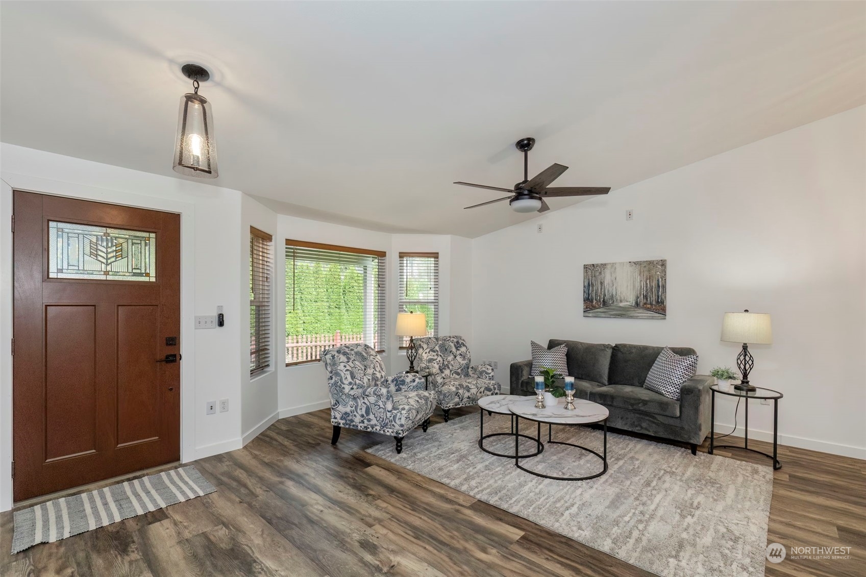 27474 Gamble Bay Road Northeast Kingston, WA 98346 - Photo 7 of 40 a living room with furniture and a window