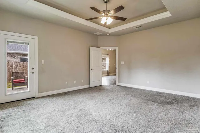 a bathroom with a granite countertop sink mirror and shower