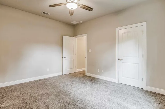 a bathroom with a toilet and a bathtub