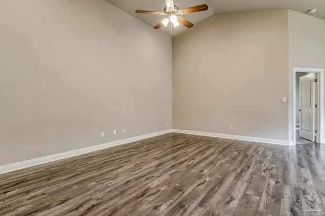 a view of kitchen with cabinets and stainless steel appliances