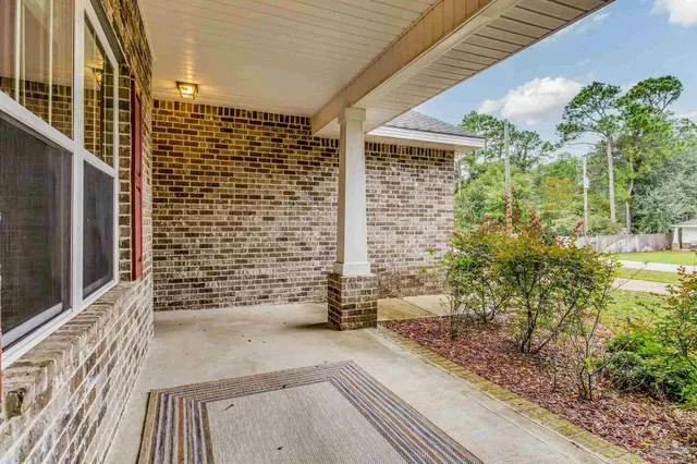 a view of a pathway both side of house
