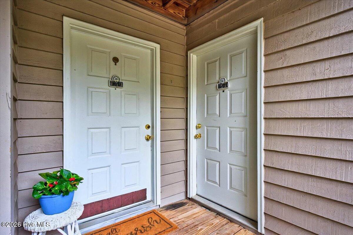 816 Colony Place Southwest, Unit D Sunset Beach, NC 28468 - Photo 4 of 55 Main and lock-out entrance
