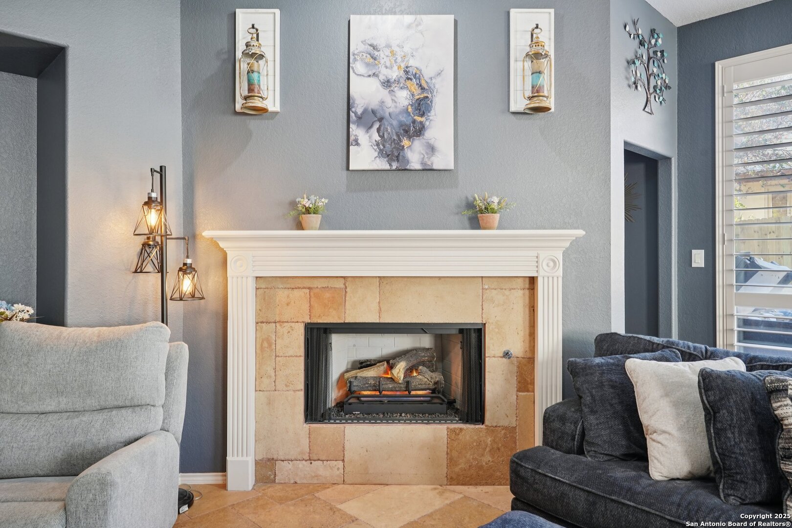 16107 Los Sedona Helotes, TX 78023 - Photo 22 of 59 a living room with furniture and a fireplace