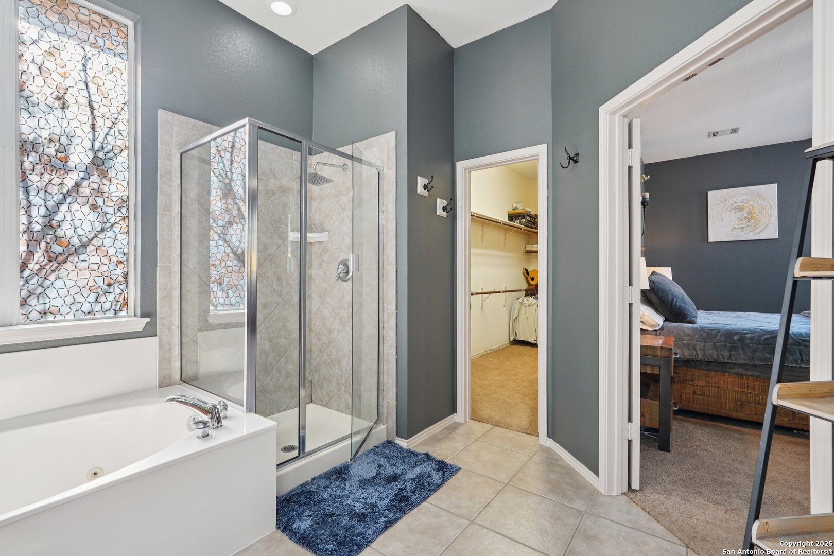 16107 Los Sedona Helotes, TX 78023 - Photo 29 of 59 a bathroom with a tub shower and sink