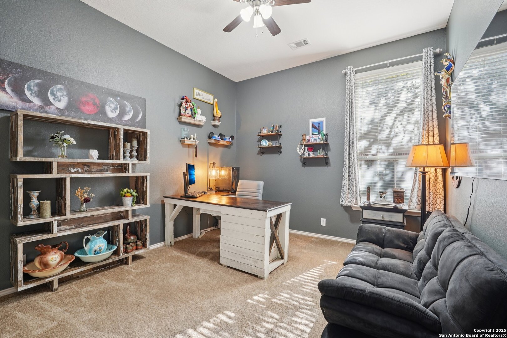 16107 Los Sedona Helotes, TX 78023 - Photo 39 of 59 a living room with furniture cabinets and window