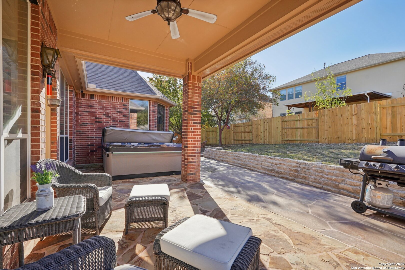 16107 Los Sedona Helotes, TX 78023 - Photo 44 of 59 a view of a patio with a table and chairs