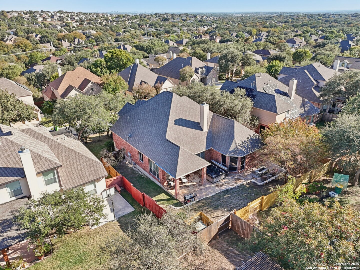 16107 Los Sedona Helotes, TX 78023 - Photo 57 of 59 an aerial view of a house with a yard and lake view