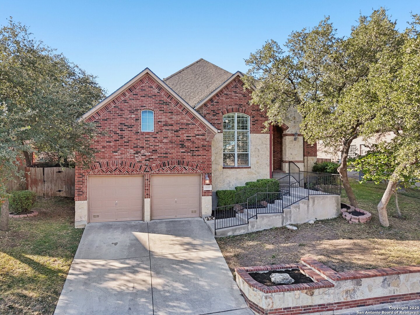16107 Los Sedona Helotes, TX 78023 - Photo 59 of 59 a front view of a house with garden