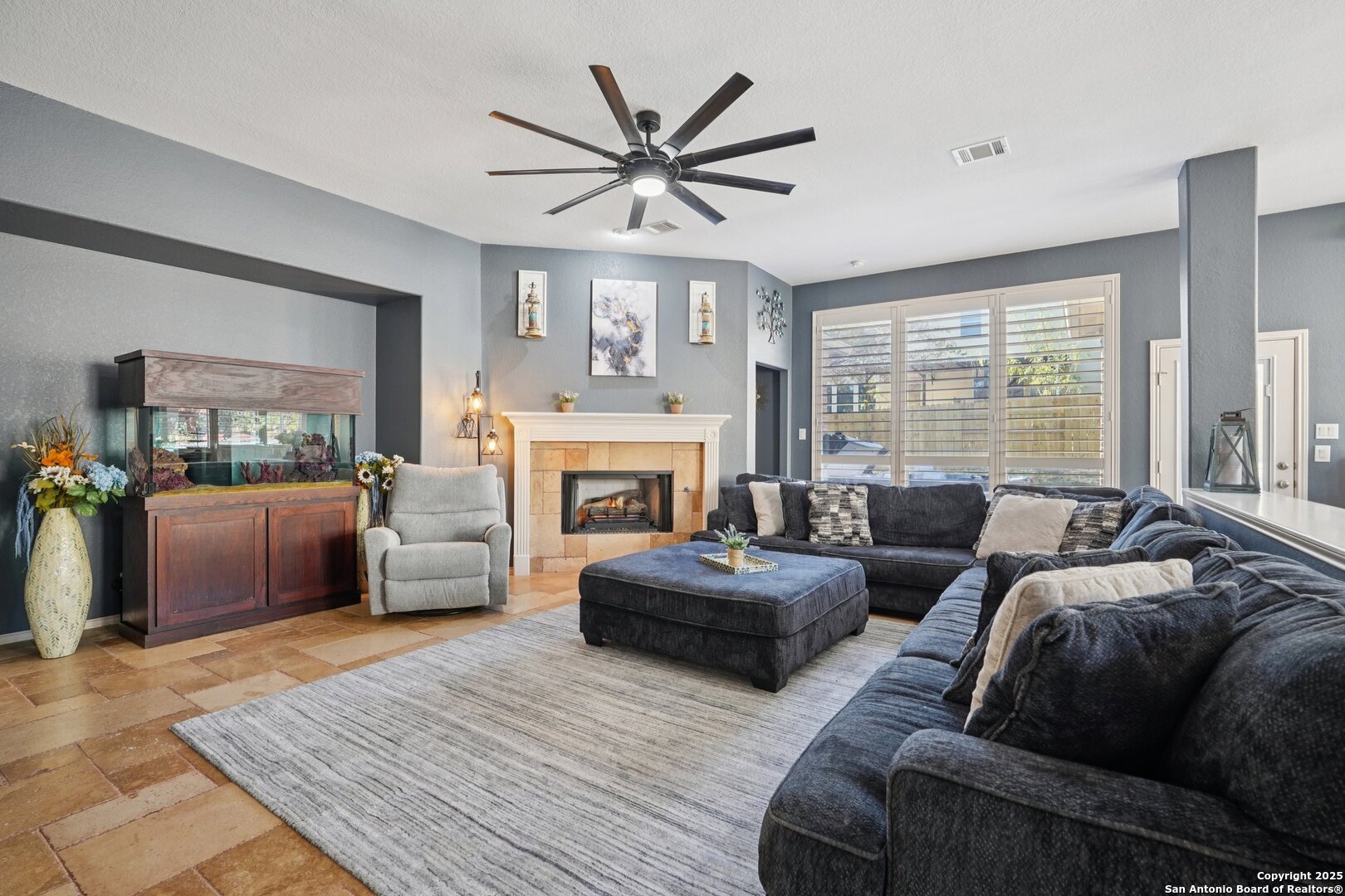 16107 Los Sedona Helotes, TX 78023 - Photo 7 of 59 a living room with furniture fireplace and a large window