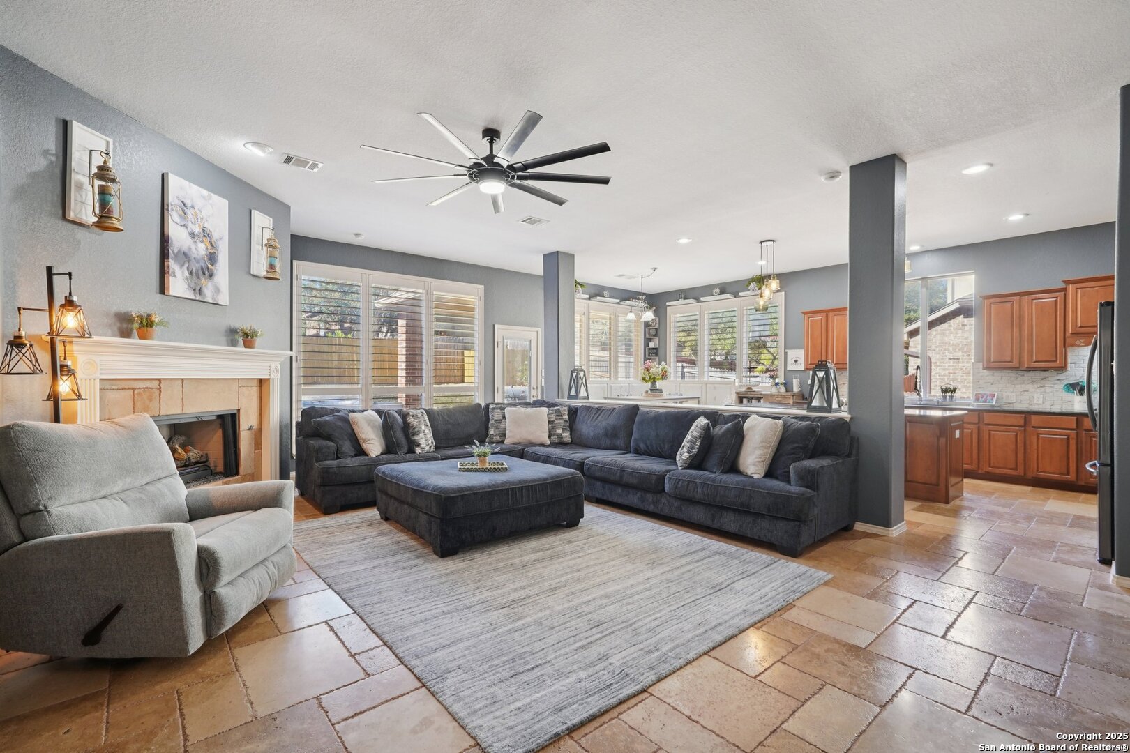 16107 Los Sedona Helotes, TX 78023 - Photo 8 of 59 a living room with furniture and a fireplace