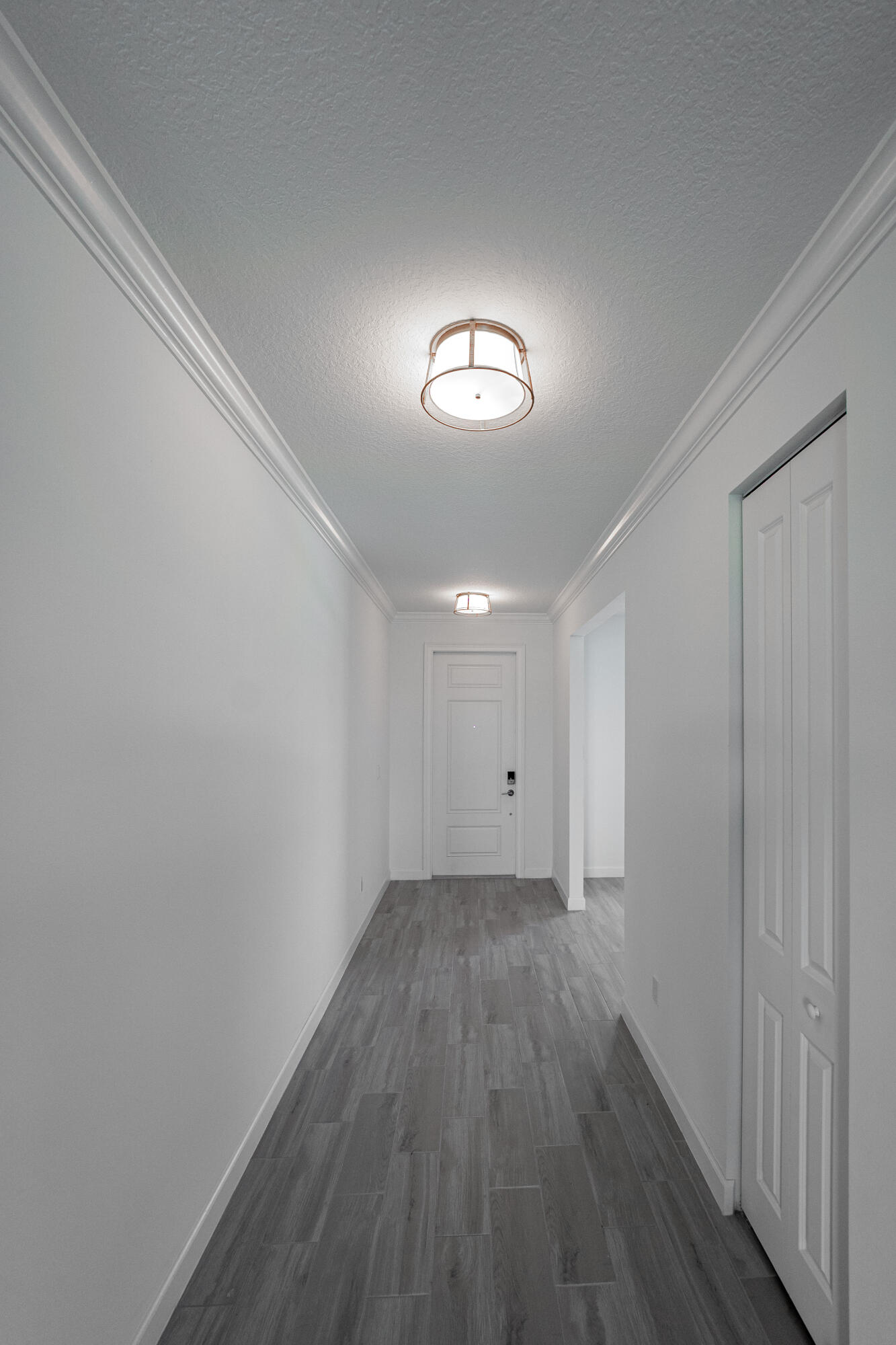 3544 Angler Drive Fort Pierce, FL 34946 - Photo 24 of 39 a view of a room with wooden floor and a window
