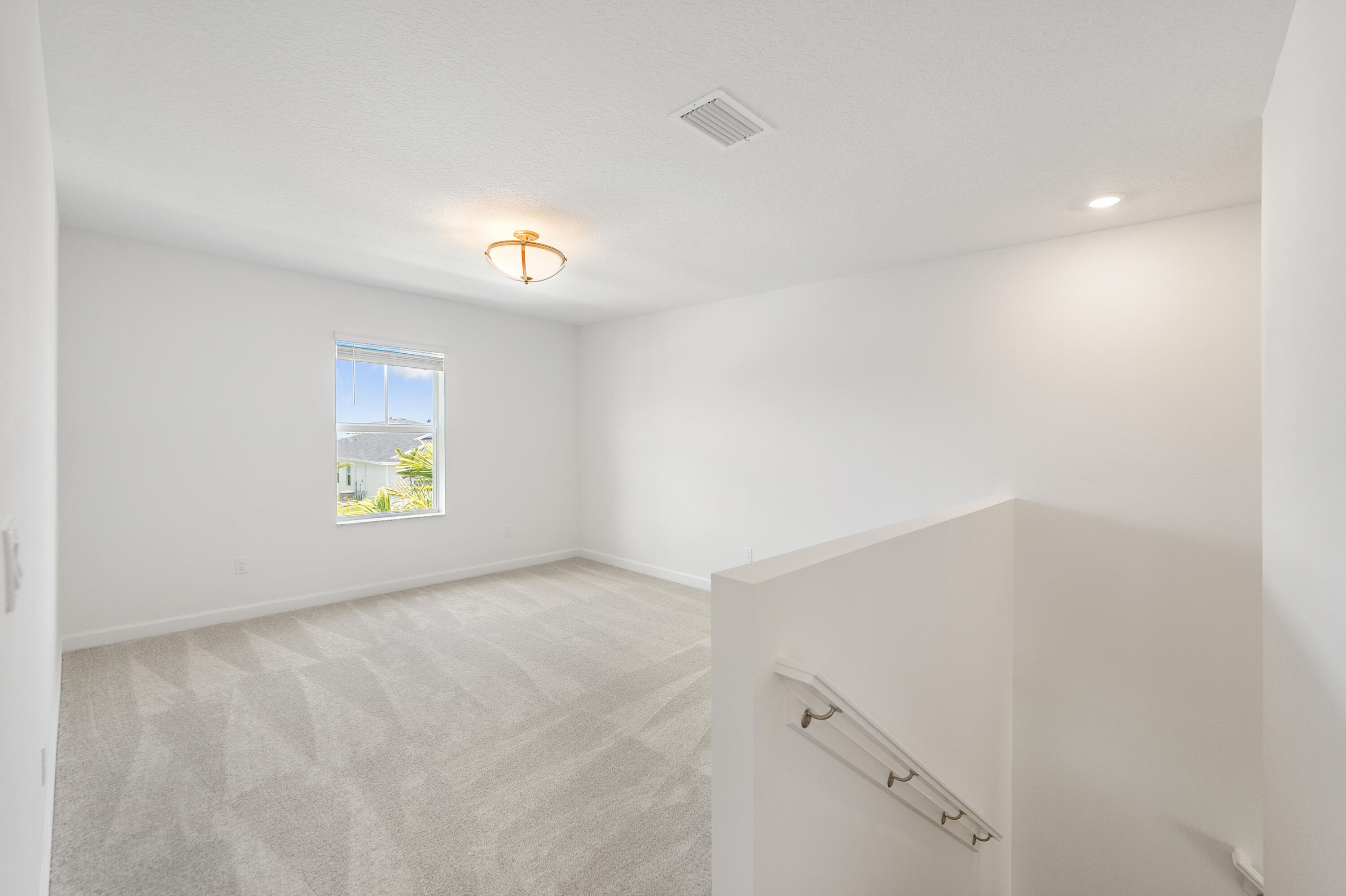 3544 Angler Drive Fort Pierce, FL 34946 - Photo 25 of 39 a view of an empty room with a window