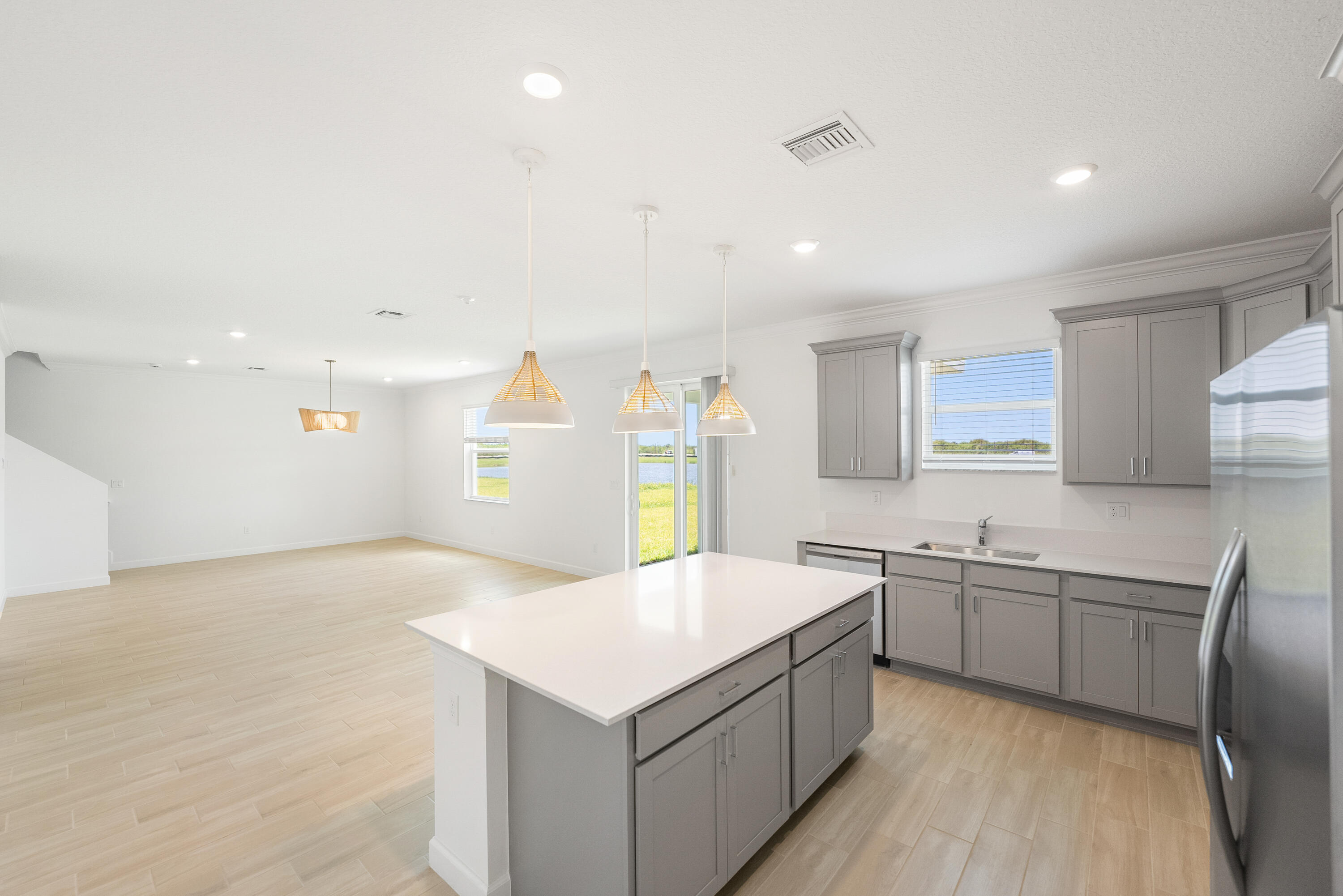 3544 Angler Drive Fort Pierce, FL 34946 - Photo 6 of 39 a kitchen with a sink and cabinets