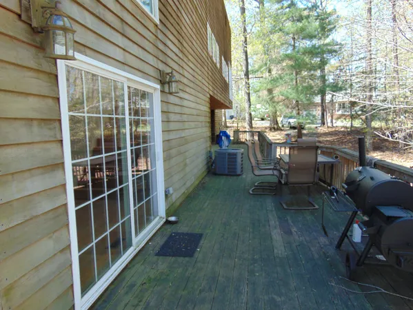 a view of balcony with lots of trees