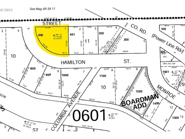 a view of a swimming pool with a sign on the wall