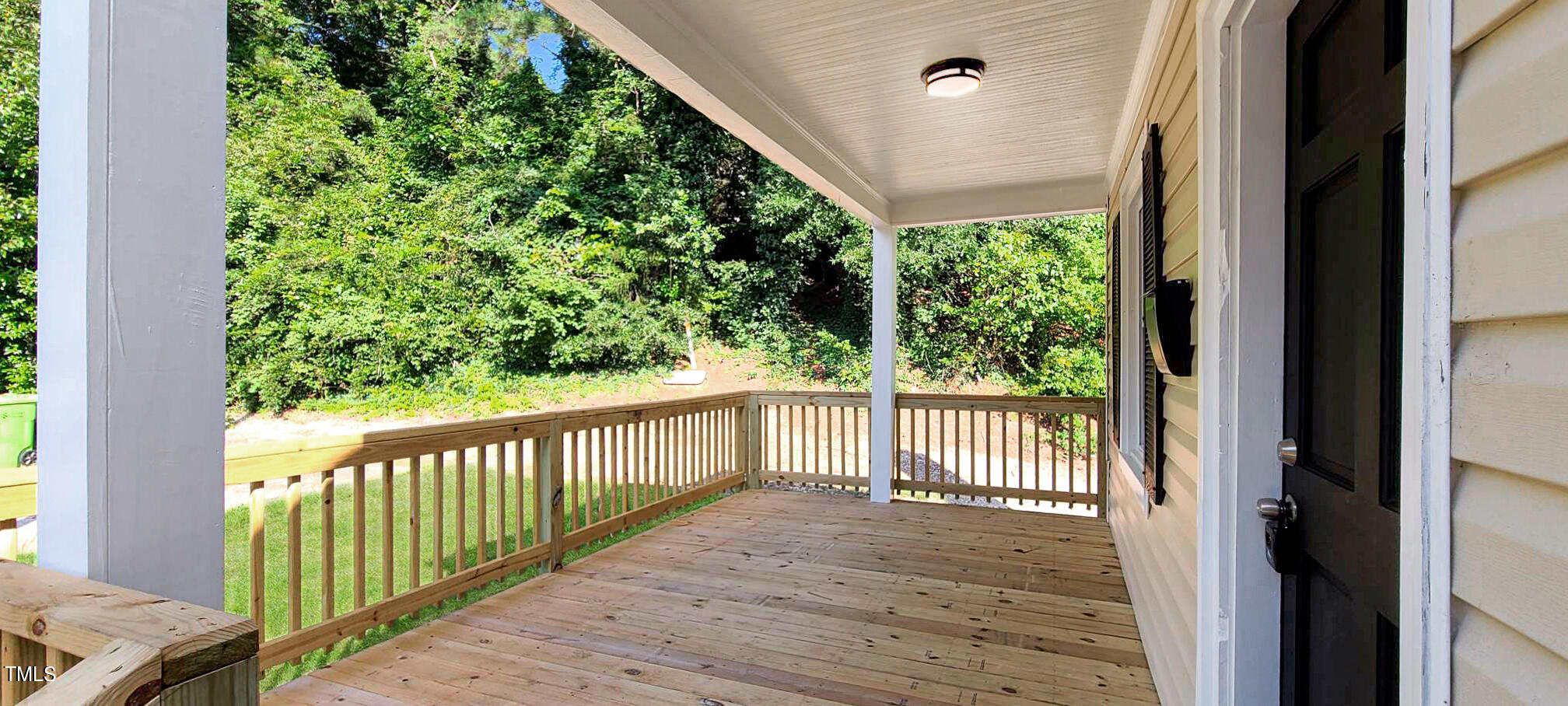 3521 Neil Street Raleigh, NC 27607 - Photo 4 of 14 a view of a balcony with wooden floor