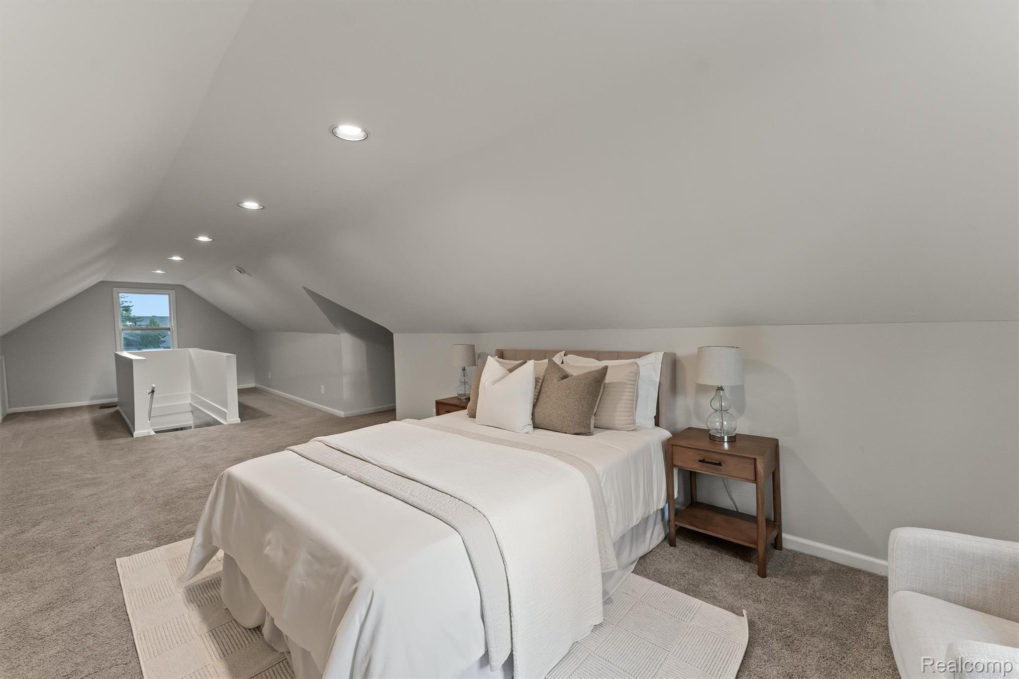 15564 Almont Road Allenton, MI 48002 - Photo 11 of 24 Carpeted flooring throughout, recessed lighting, sloped ceiling, and a window