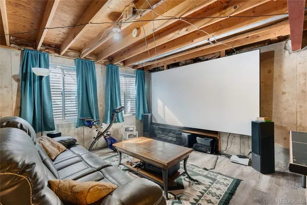 a living room with furniture and a table