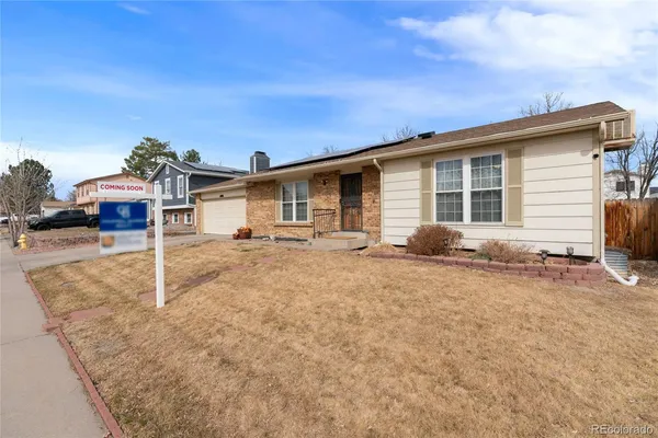 a house with yard in front of it