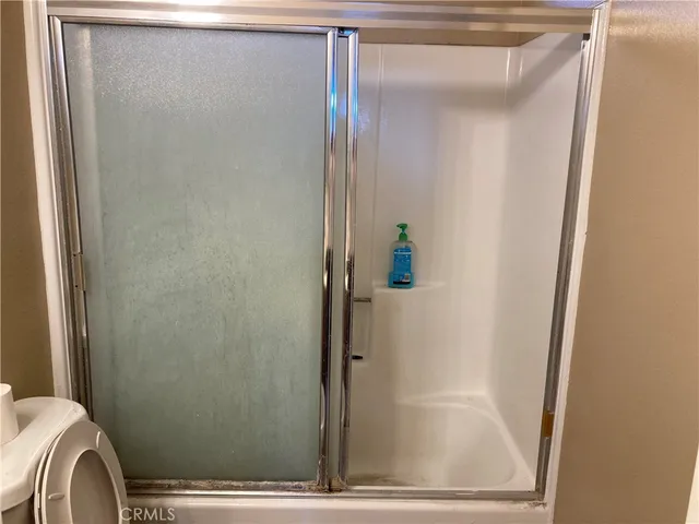 a view of entryway with kitchen