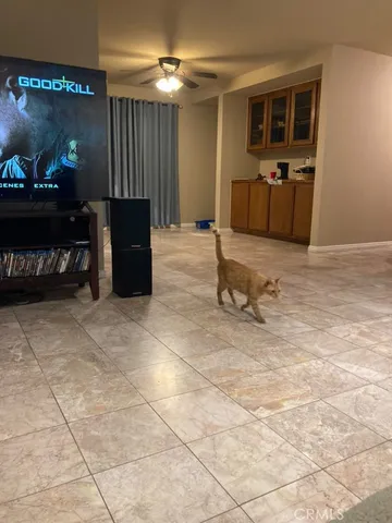 a large kitchen with stainless steel appliances a cabinets and a counter top space