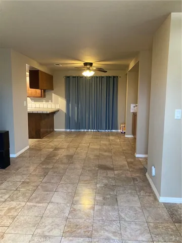 an empty room with a mirror