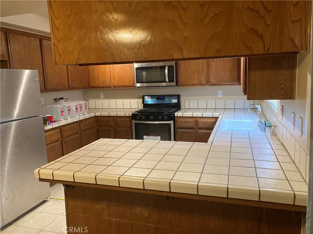 a view of livingroom with furniture and a flat screen tv