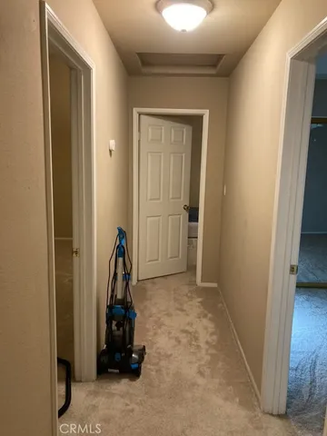 a room with furniture and a window