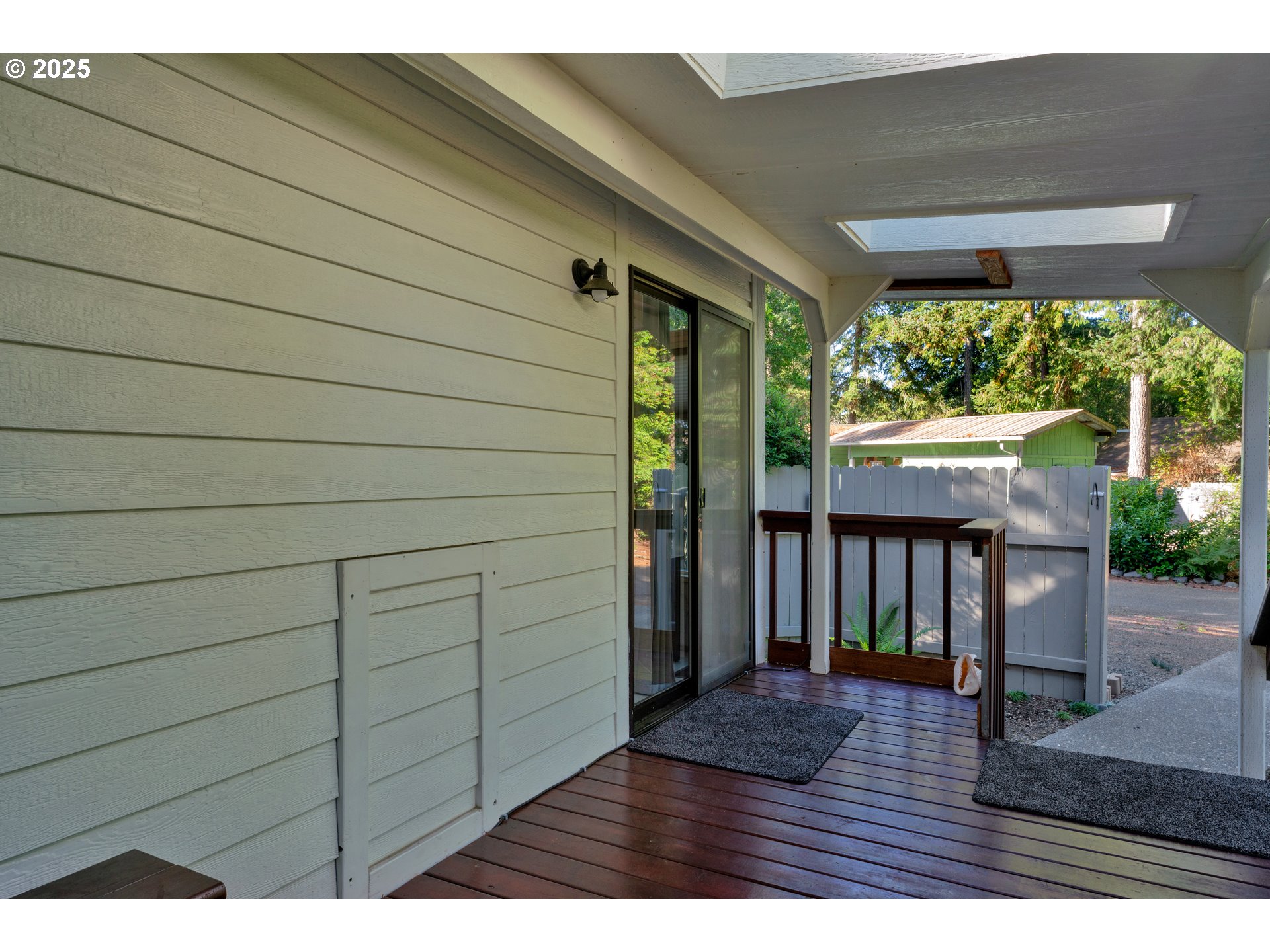 225 Azalea Street Florence, OR 97439 - Photo 3 of 15 a view balcony with wooden floor