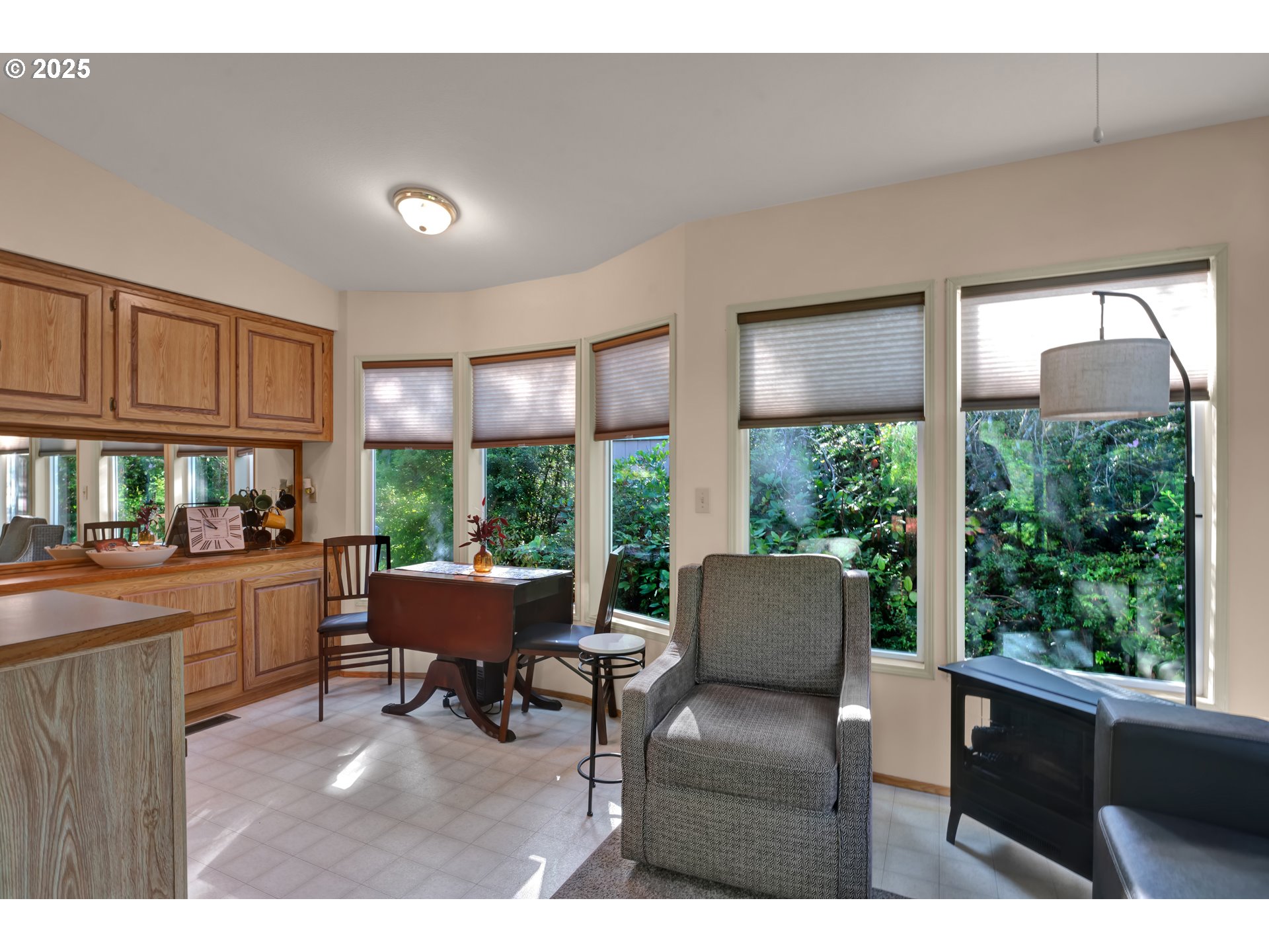 225 Azalea Street Florence, OR 97439 - Photo 4 of 15 a living room with furniture and a window