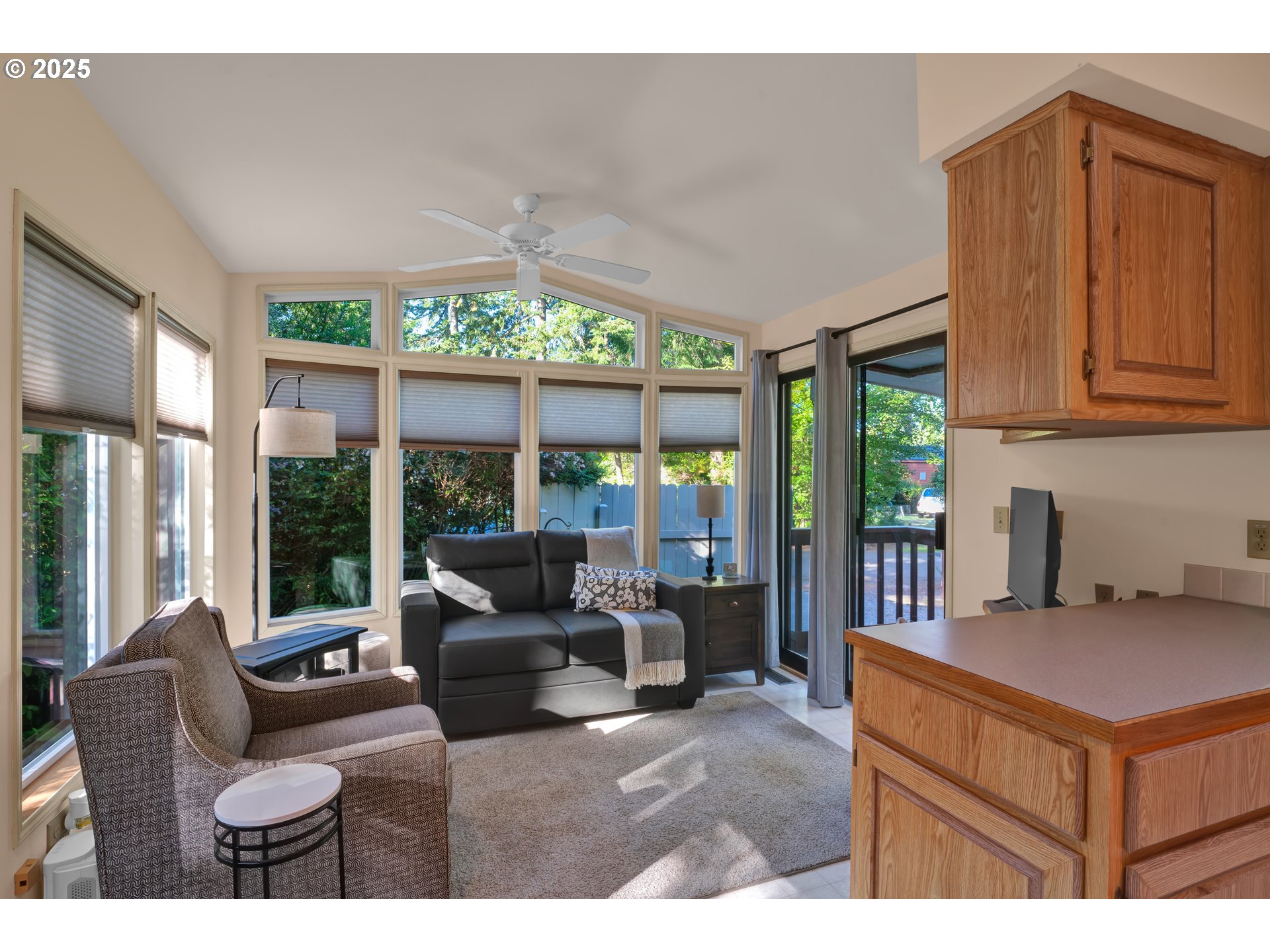 225 Azalea Street Florence, OR 97439 - Photo 5 of 15 a living room with furniture a large window with outer view