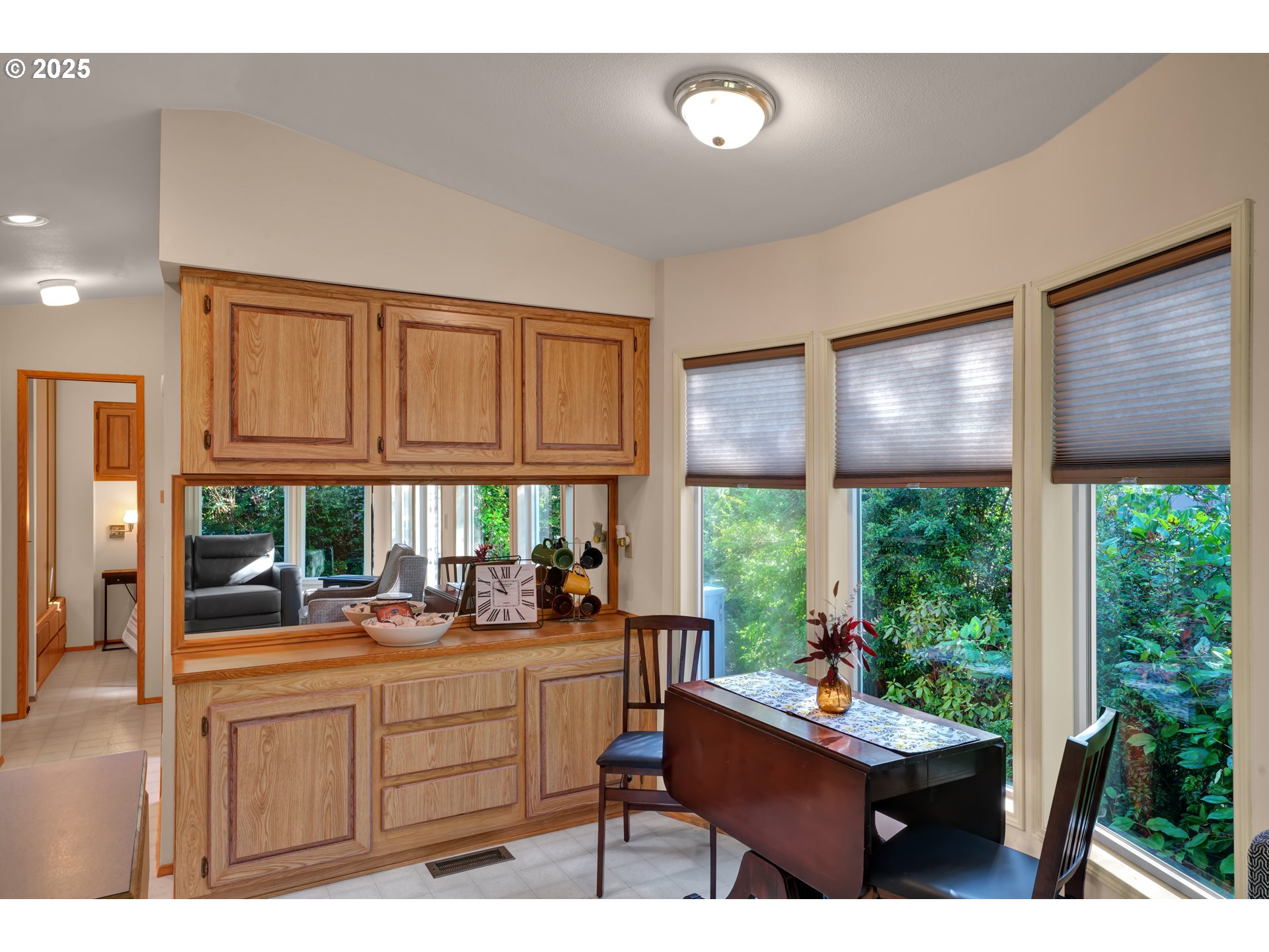 225 Azalea Street Florence, OR 97439 - Photo 7 of 15 a room with furniture a window and a potted plant