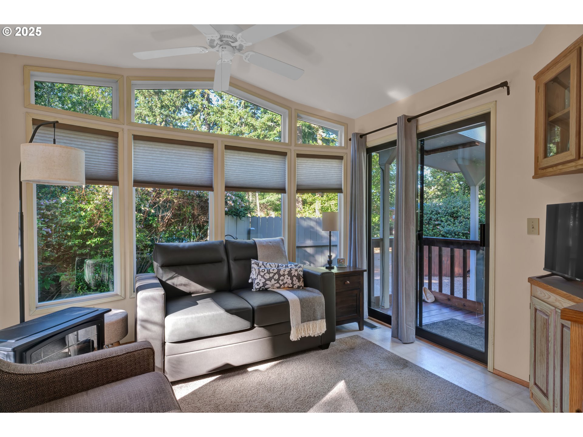 225 Azalea Street Florence, OR 97439 - Photo 10 of 15 a living room with large windows