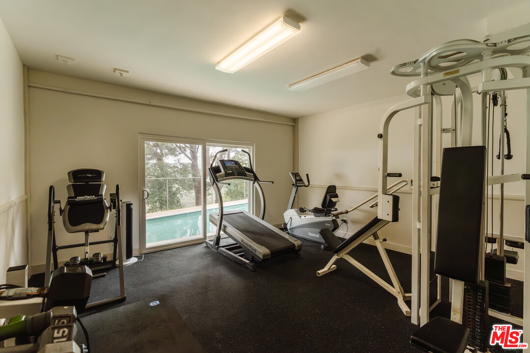 2345 Roscomare Road, Unit 303 Los Angeles, CA 90077 - Photo 20 of 23 a view of a livingroom with workspace and a window