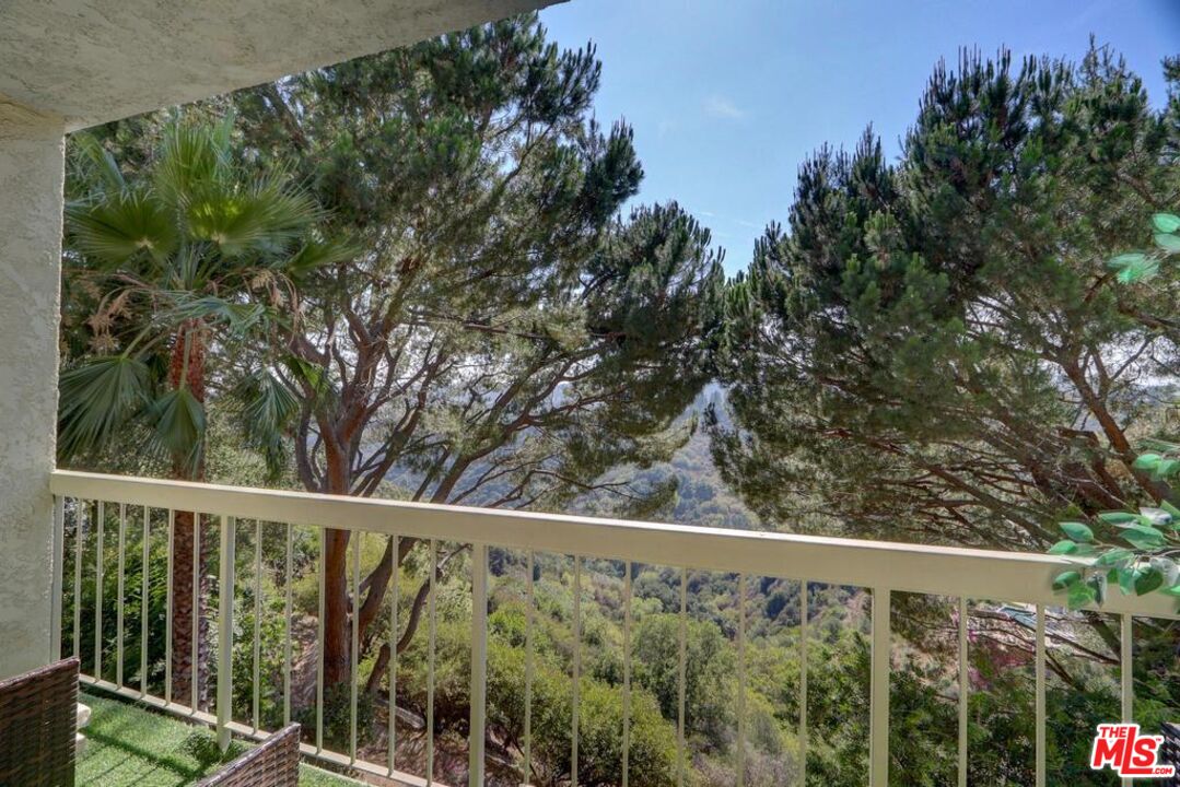 2345 Roscomare Road, Unit 303 Los Angeles, CA 90077 - Photo 6 of 23 a view of with green trees