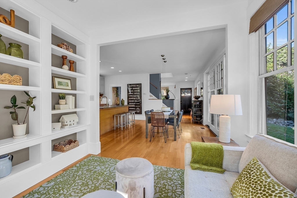 38 Downing Road Lexington, MA 02421 - Photo 14 of 41 a living room with furniture and a table