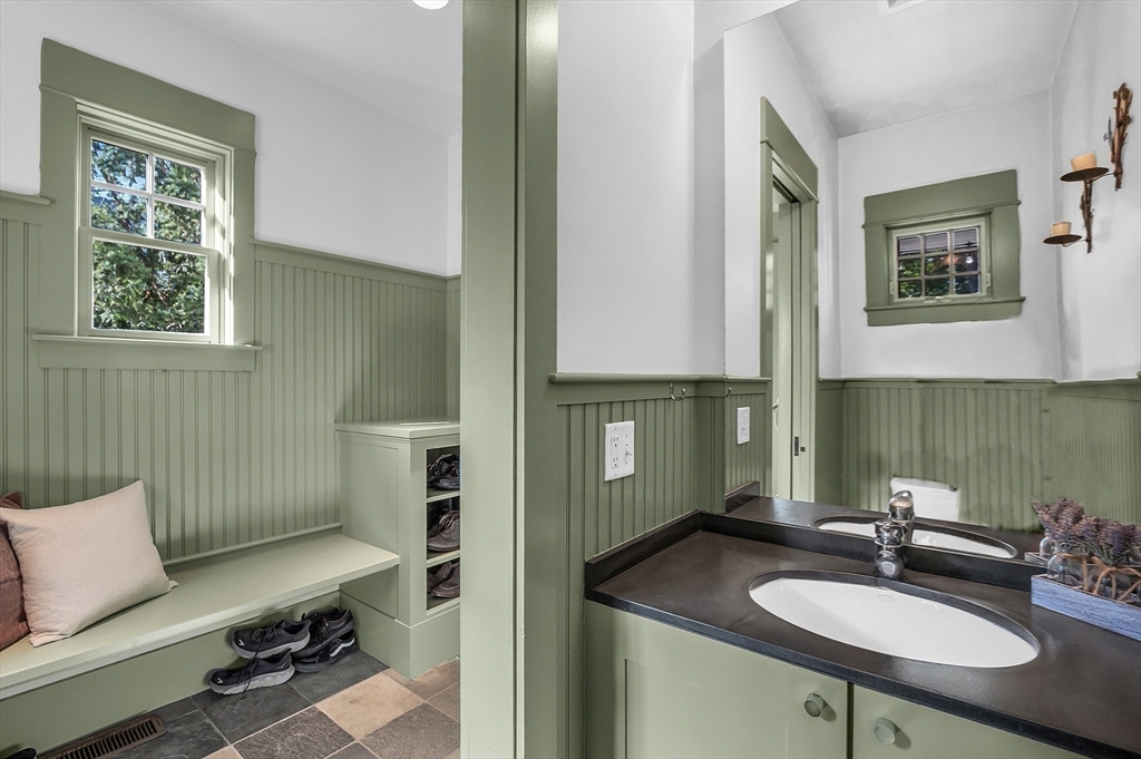 38 Downing Road Lexington, MA 02421 - Photo 17 of 41 a bathroom with a sink double vanity and a mirror