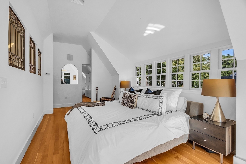 38 Downing Road Lexington, MA 02421 - Photo 18 of 41 a living room with furniture and a lamp