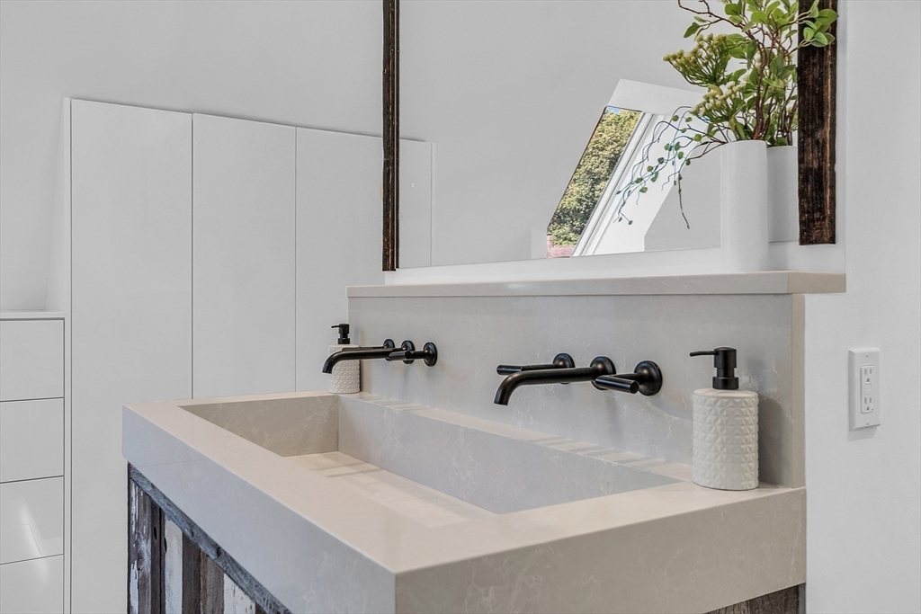 38 Downing Road Lexington, MA 02421 - Photo 20 of 41 a bathroom with a bathtub