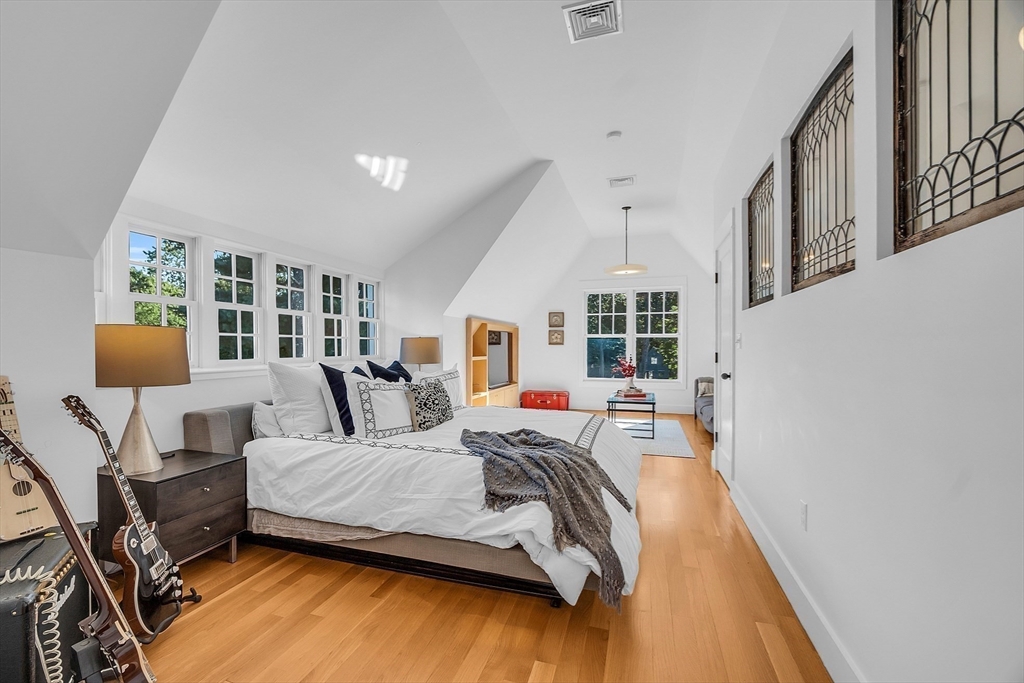 38 Downing Road Lexington, MA 02421 - Photo 24 of 41 a bedroom with a bed wooden floor and window
