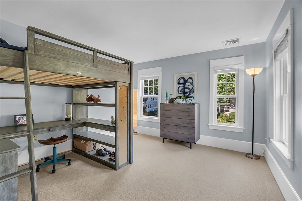 38 Downing Road Lexington, MA 02421 - Photo 27 of 41 a room with furniture and a window