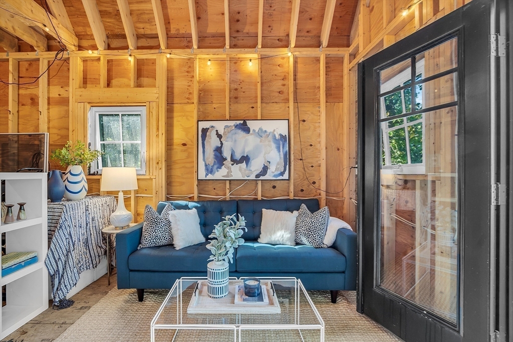 38 Downing Road Lexington, MA 02421 - Photo 33 of 41 a living room with furniture and a large window