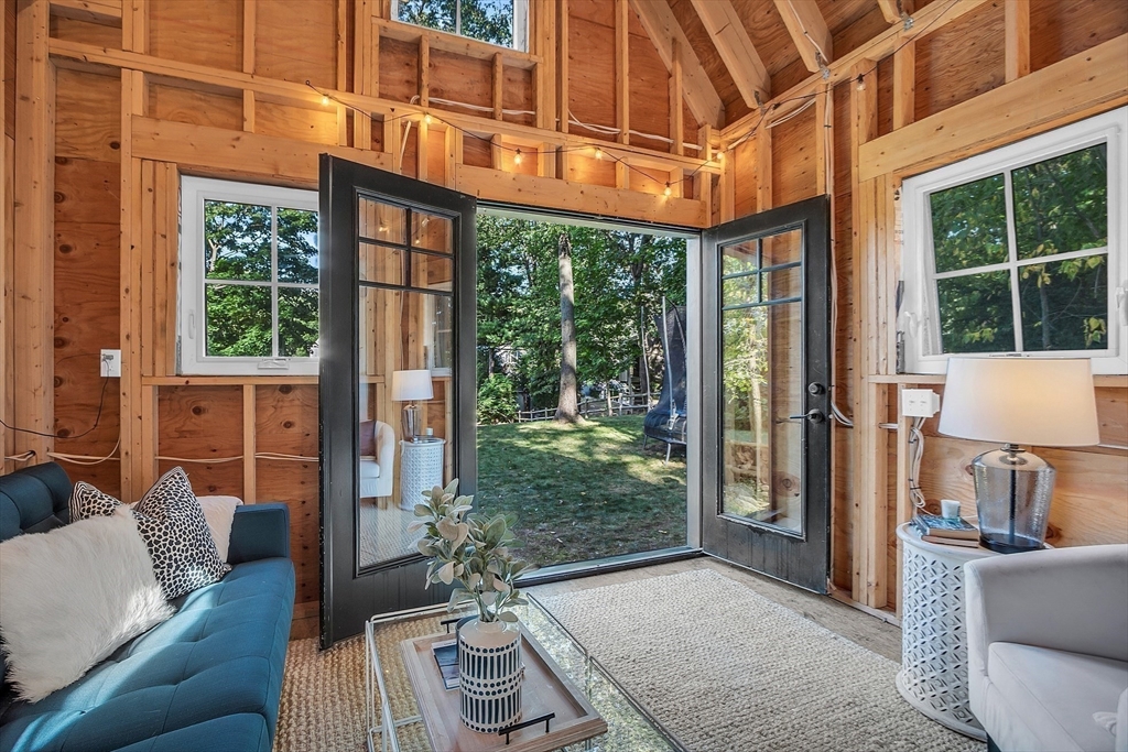 38 Downing Road Lexington, MA 02421 - Photo 34 of 41 a view of a patio with couches and potted plants