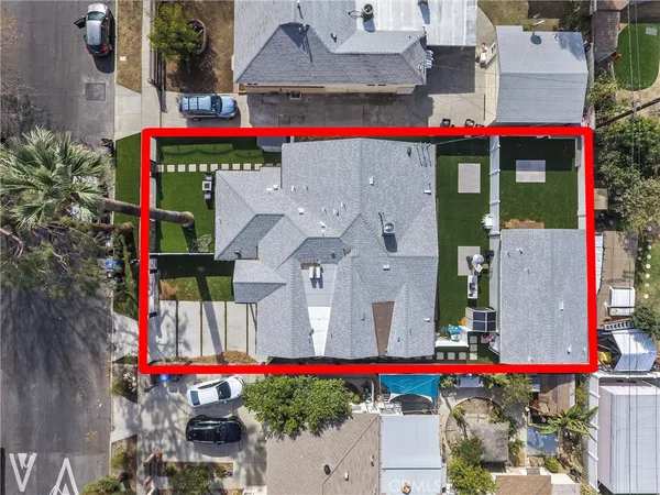 a view of a backyard with a tub and wooden floor