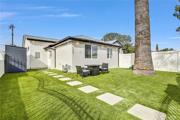 a view of a hallway with washer and dryer